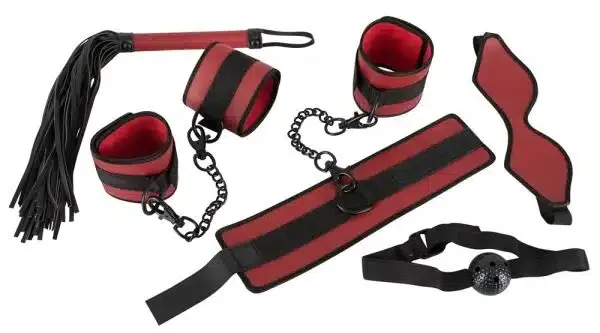 Bad Kitty Fesselset: Maske, Peitsche, Knebel, Hand- und Fußfesseln rot-schwarz