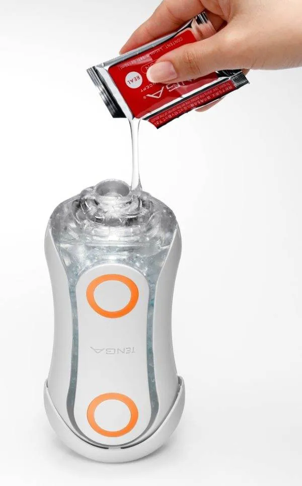 TENGA Flip Orb - Blowjob-Simulation & 2-Punkte-Stimulation Weiß/Transparent/Orange TENGA Flip Orb - Blowjob-Simulation & 2-Punkte-Stimulation Weiß/Transparent/Orange